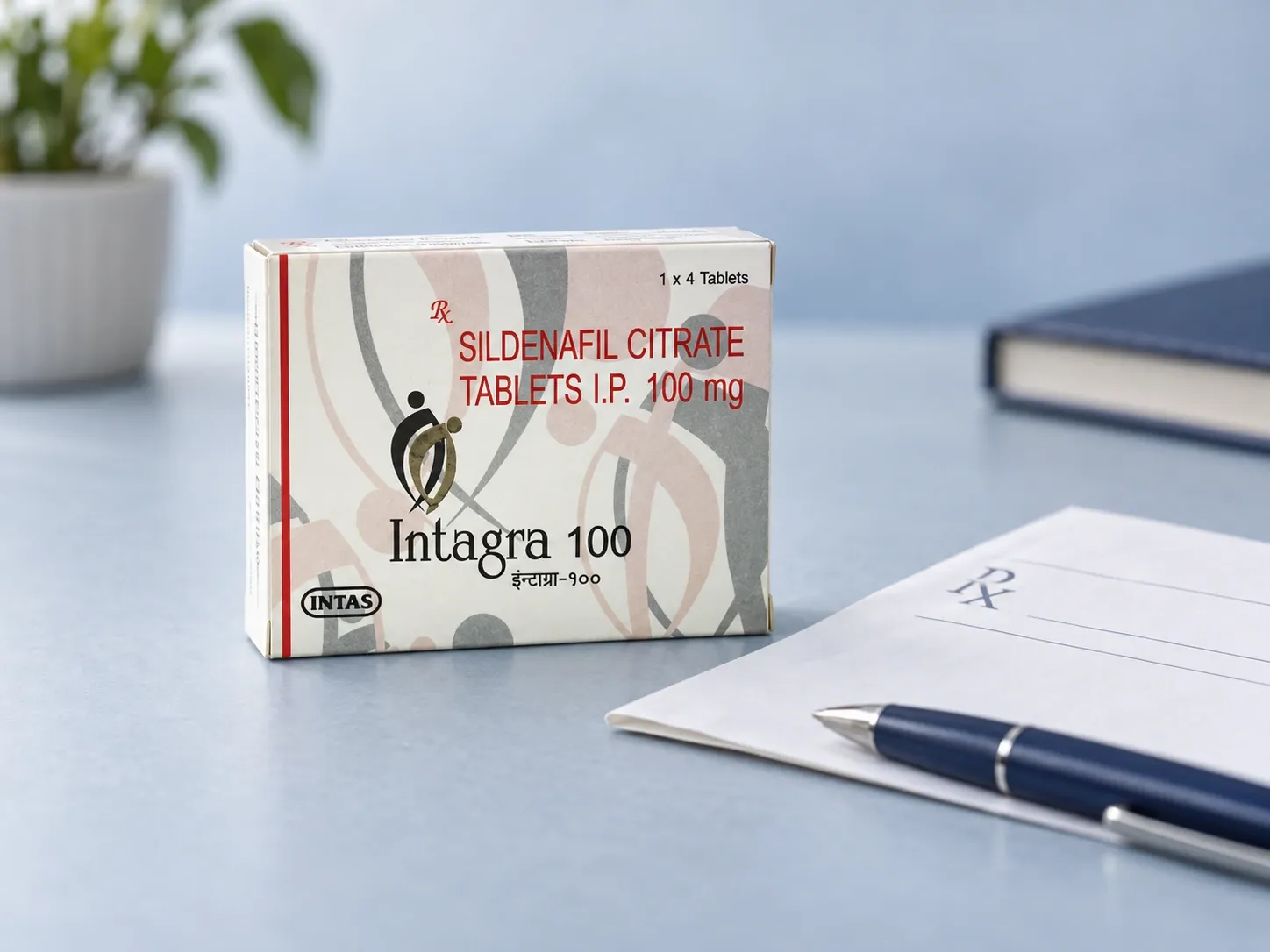 Editorial illustration of Intagra 100 example packaging on a medicine-review desk
